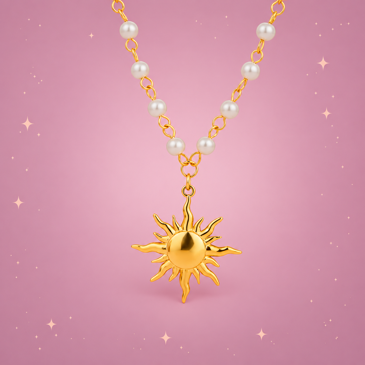 18K Gold-Plated Pearl Sun Necklace on a dusty rose background with rose gold sparkles