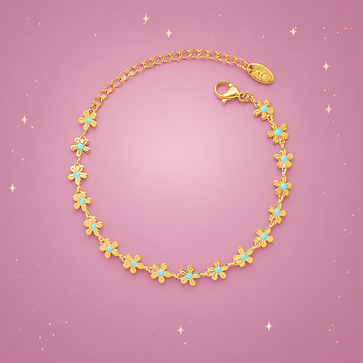 Blue Enamel Flower Bracelet on a dusty rose background with rose gold sparkles