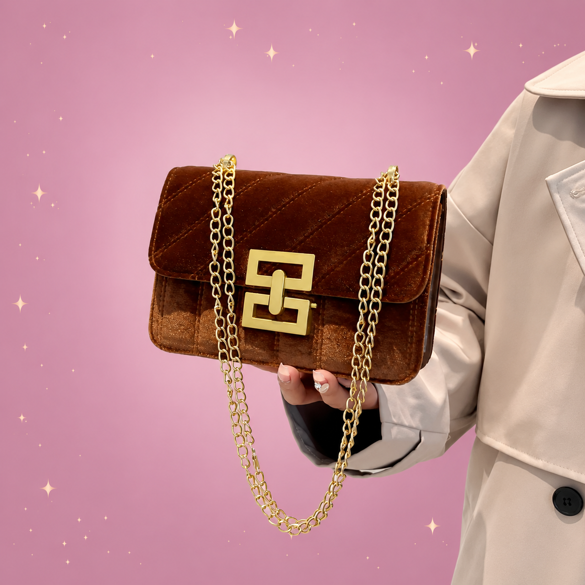 Chain Shoulder Bag on a dusty rose background with rose gold sparkles
