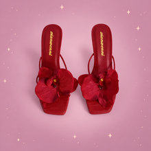 Flower High-Heel Sandals on a dusty rose background with rose gold sparkles