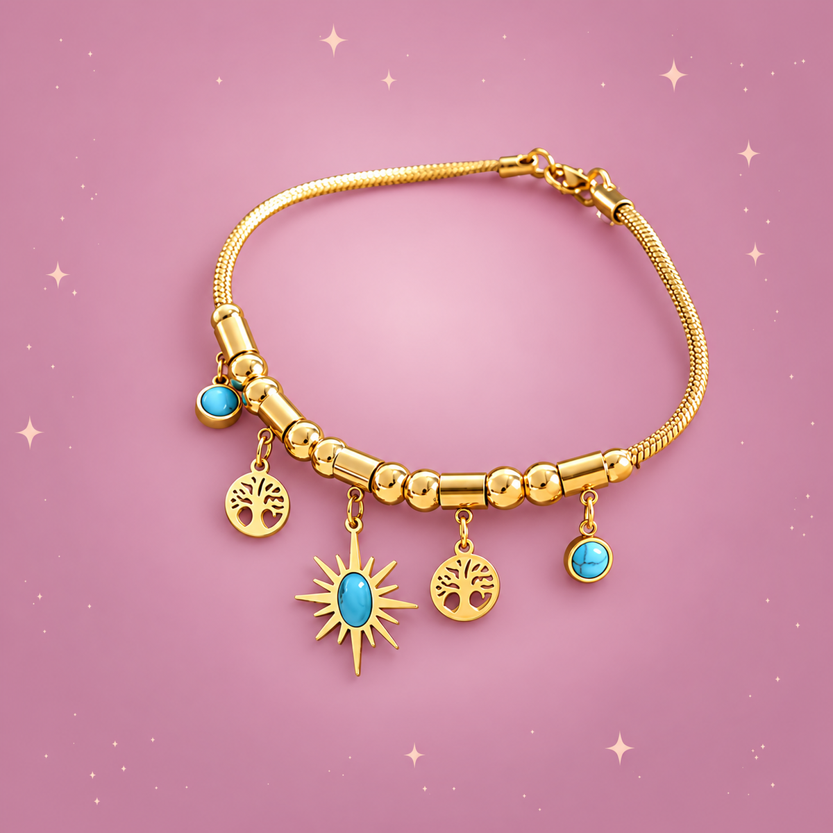 Gold-Plated Charm Bracelet on a dusty rose background with rose gold sparkles
