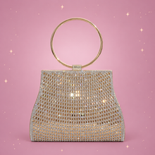 Magnetic Clasp Chain Bag on a dusty rose background with rose gold sparkles
