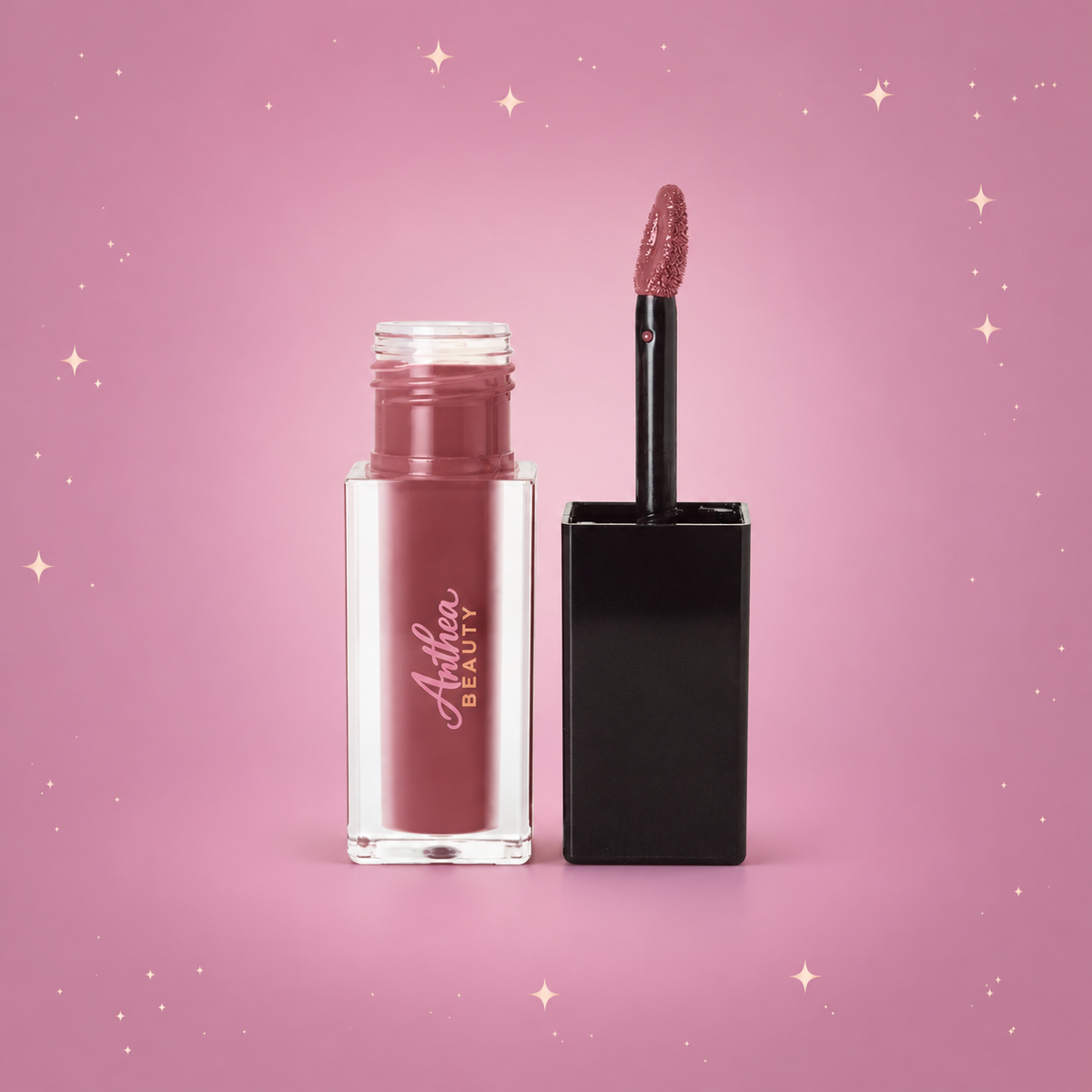 Dark Cherry Matte Lip Stain — complete product centered on a blush pink background with rose gold sparkles