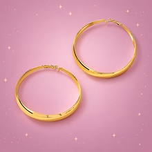 Statement Hoop Earrings on a dusty rose background with rose gold sparkles