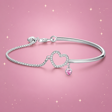 Sterling Silver Bracelet on a dusty rose background with rose gold sparkles