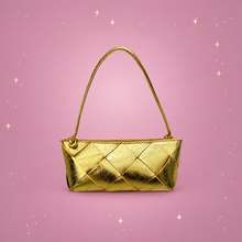 Woven Crossbody Bag on a dusty rose background with rose gold sparkles